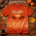 Tee Life Autumn Drift Tee - orange t-shirt with fall forest lake landscape and Tee Life script