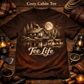 Tee Life Cozy Cabin Tee - dark brown t-shirt with moonlit cabin deer and forest scene